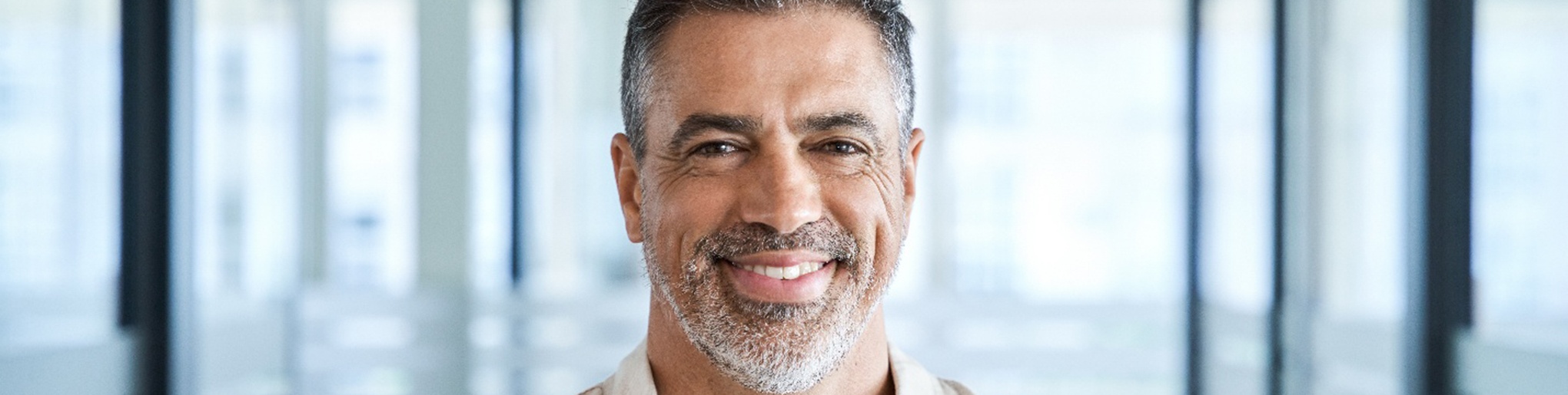 Closeup of man smiling in office