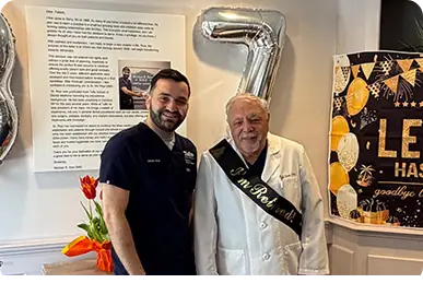 Doctor Dion at his retirement party with Doctor Ropi